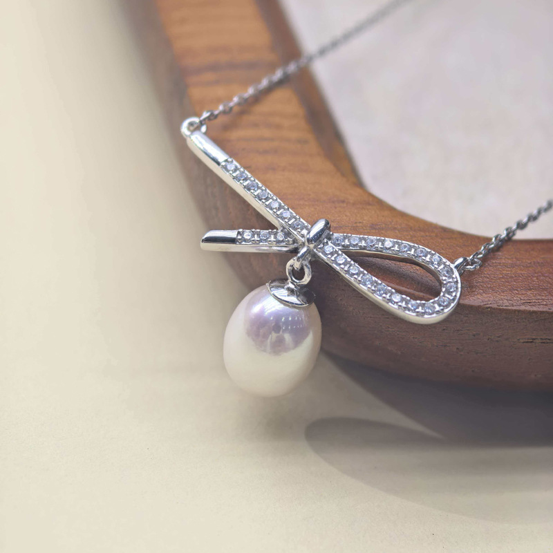 8 9mm蝴蝶結無核米珠天然淡水珍珠s925銀鎖骨鍊